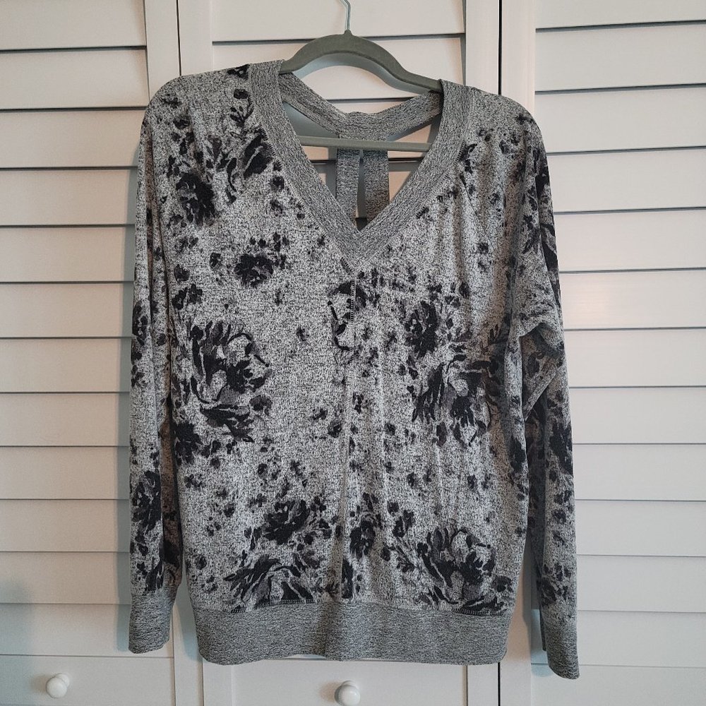 Super soft light weight sweater with cute back details